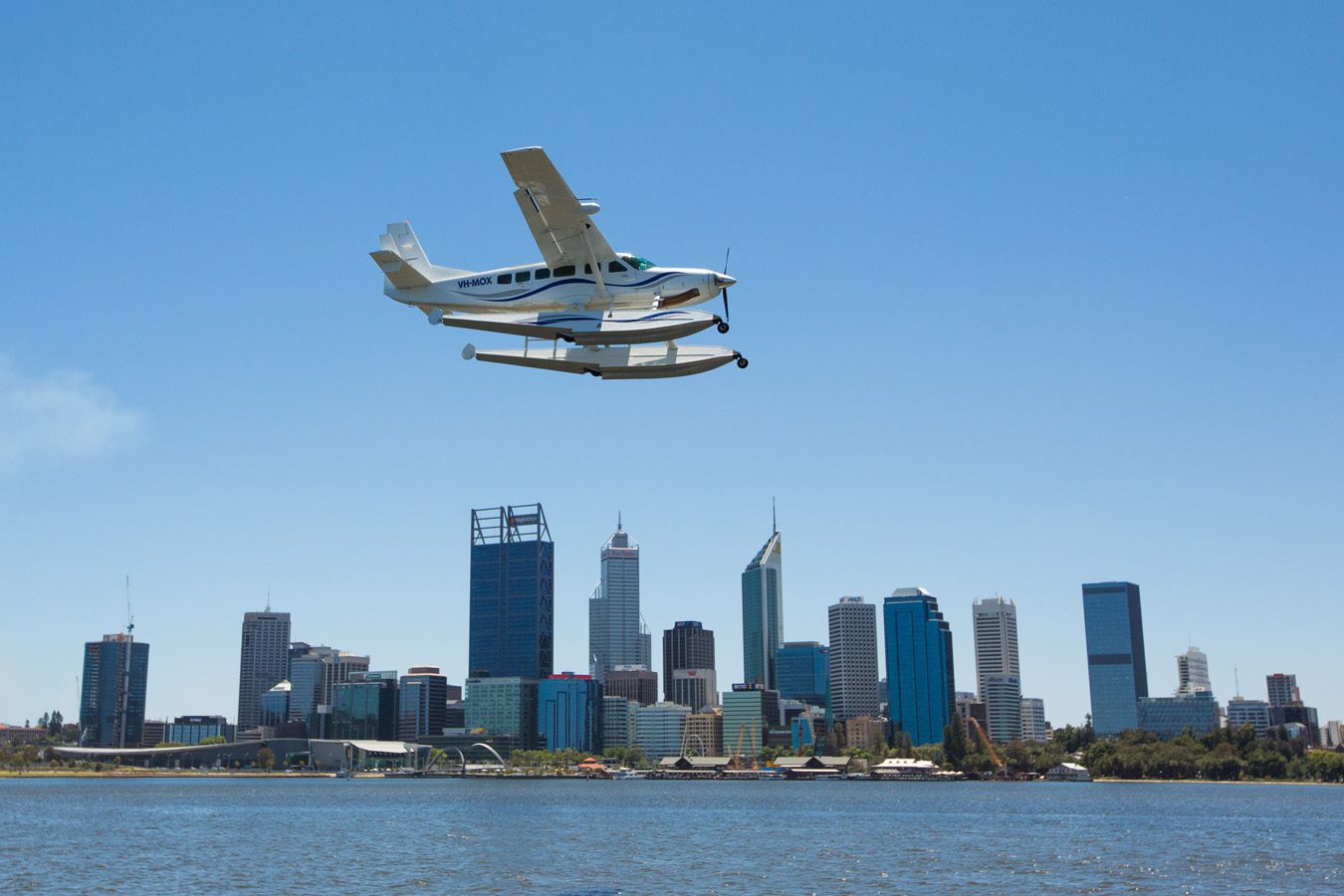 Cessna 208 over Perth City